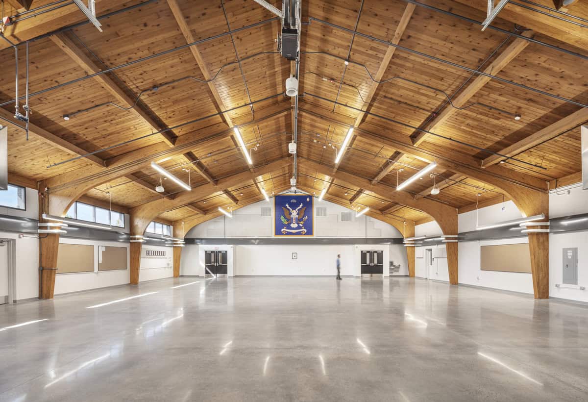 Interior of Appleton Readiness center, wood vaulted roof.